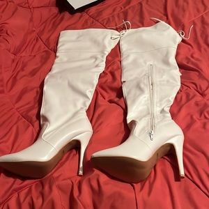 Viva size 9 never worn stiletto thigh high. Off white in color